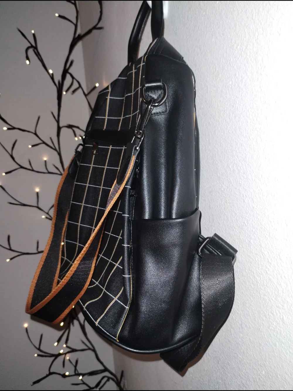 Black Grid-Pattern Backpack with Contrast Brown Strap